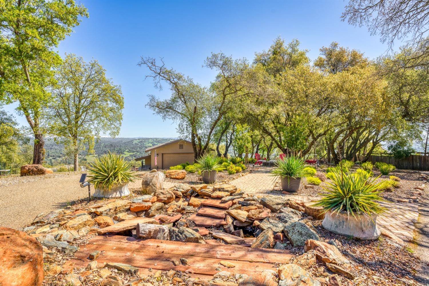 5161 Coyote Pass Road Shingle Springs, CA 95682 - Photo 43 of 48 a view of a backyard of the house