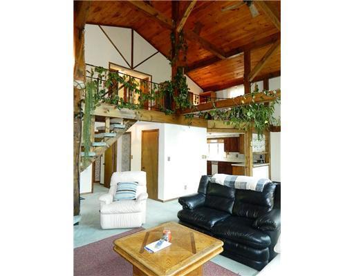 493 Flat Road Bethel, ME 04217 - Photo 7 of 25 Living Room. The open loft area is...