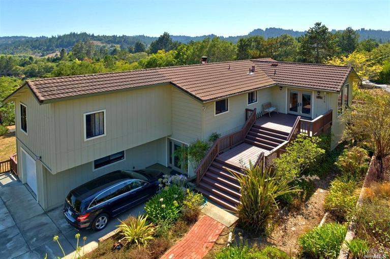 515 Grandview Road Sebastopol, CA 95472 - Photo 1 of 1 an aerial view of a house with balcony and trees al around