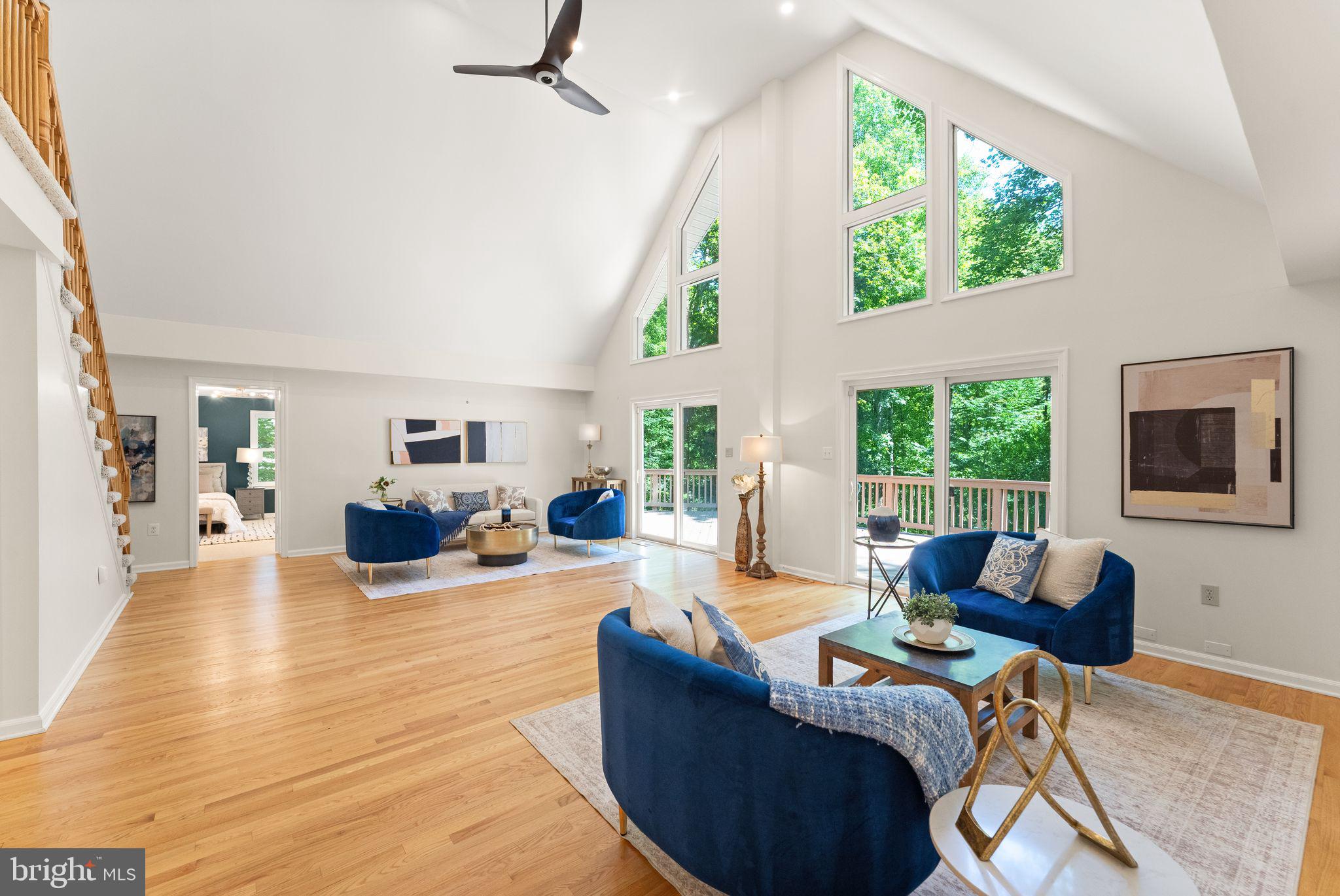 38620 Lime Kiln Road Leesburg, VA 20175 - Photo 20 of 87 a living room with furniture and a flat screen tv