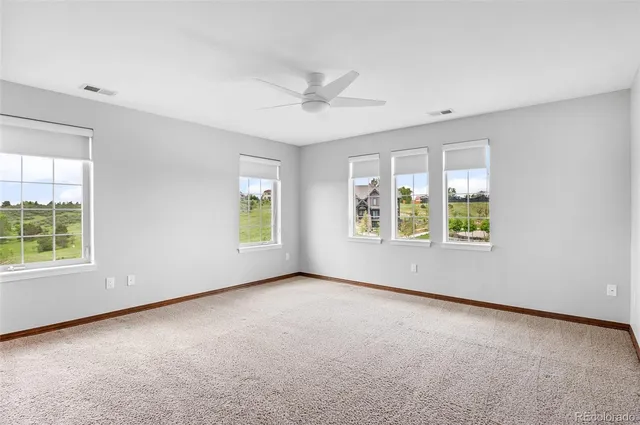 a bedroom with furniture and a fireplace