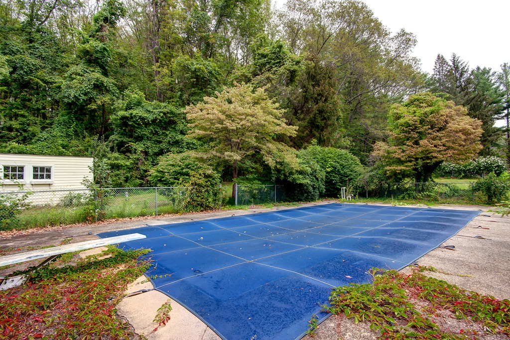 112 Wallace Road Sturbridge, MA 01566 - Photo 12 of 30 a view of an empty room with a yard