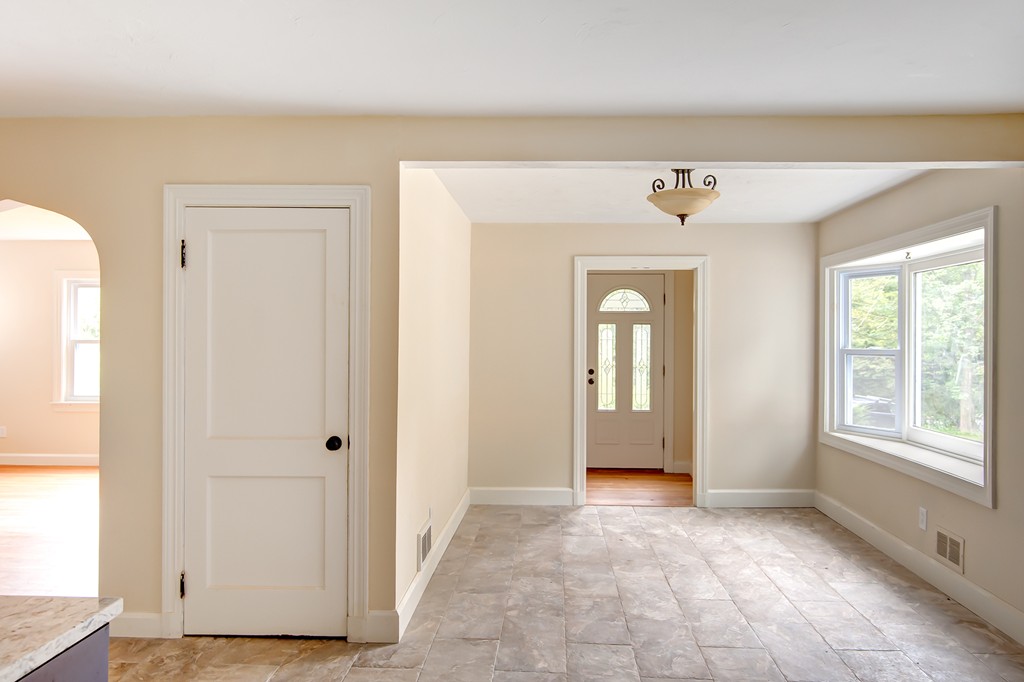 112 Wallace Road Sturbridge, MA 01566 - Photo 18 of 30 a view of a big room with windows and closet