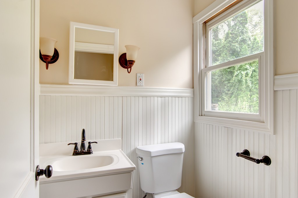 112 Wallace Road Sturbridge, MA 01566 - Photo 19 of 30 a bathroom with a sink and a mirror
