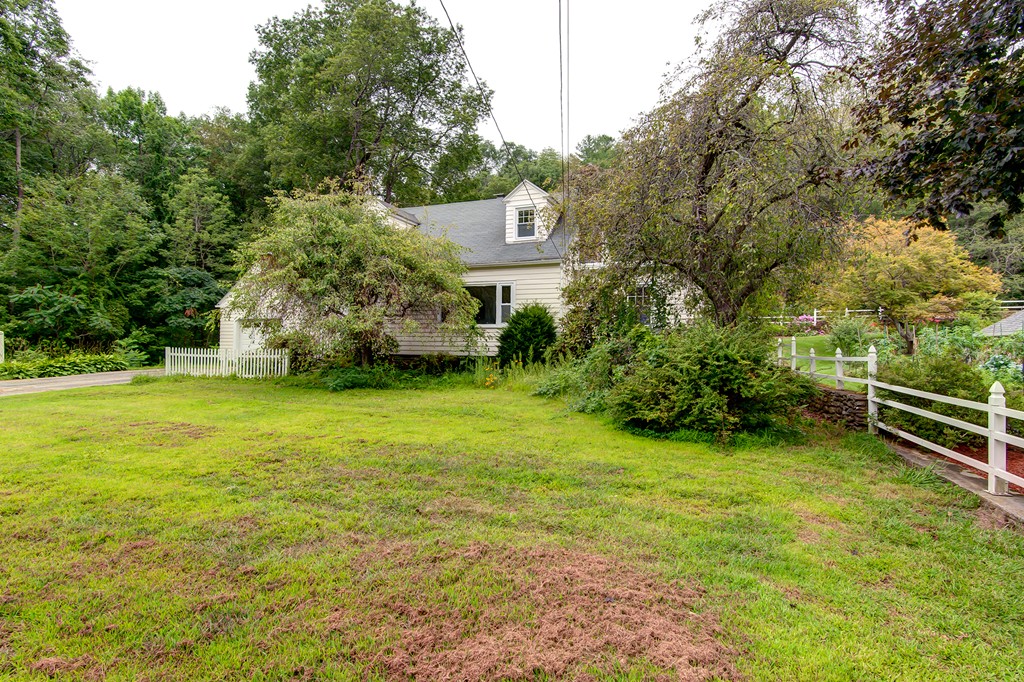 112 Wallace Road Sturbridge, MA 01566 - Photo 2 of 30 a view of a house with a yard