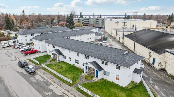 an aerial view of a house with a garden