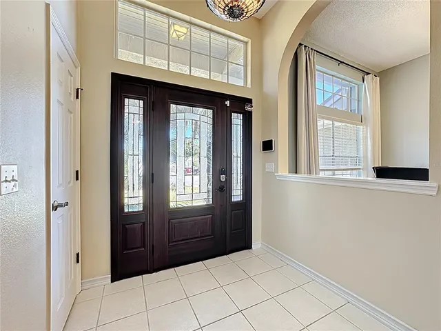 a view of an entryway with a door