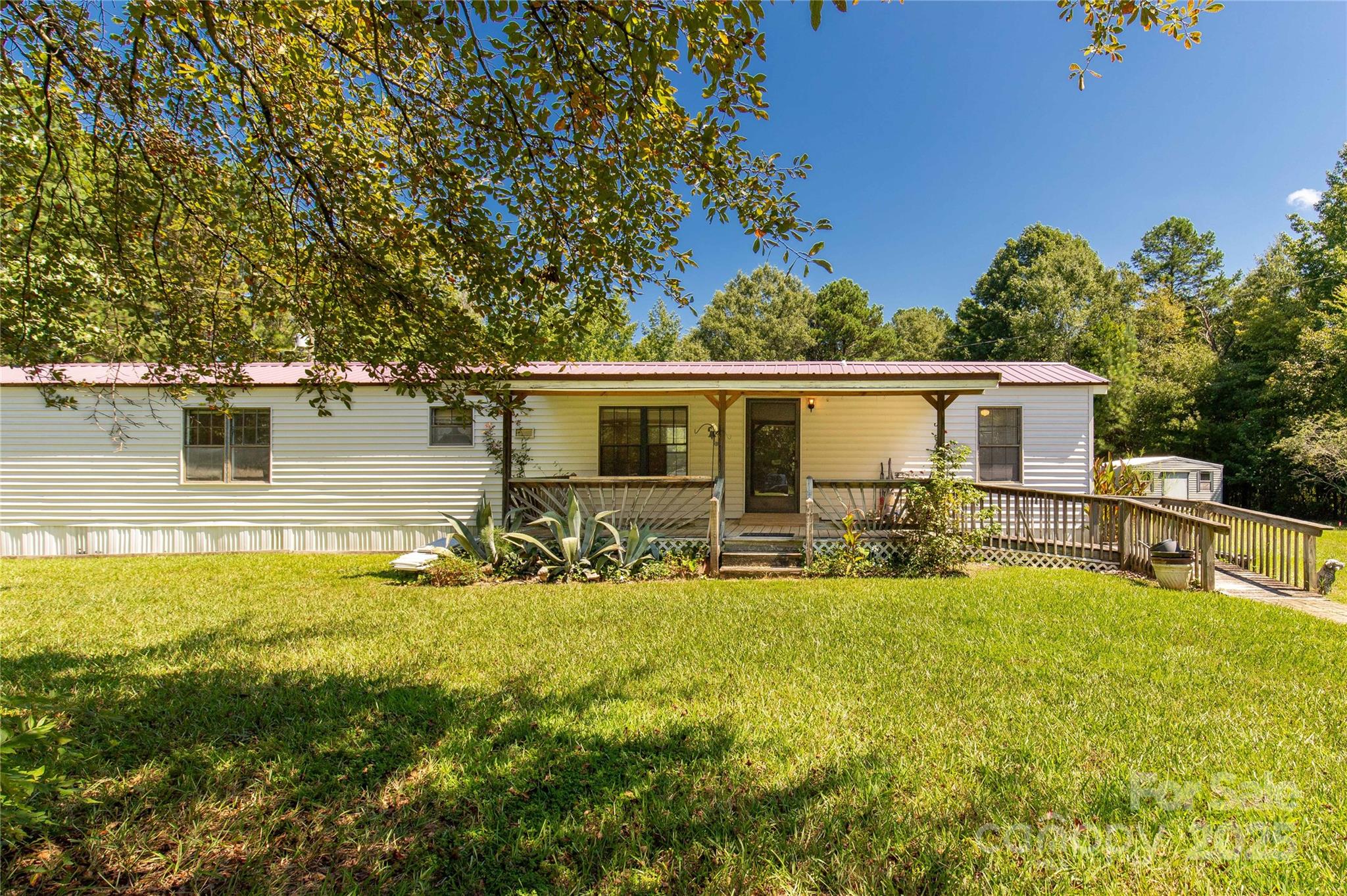 a view of a house with swimming pool