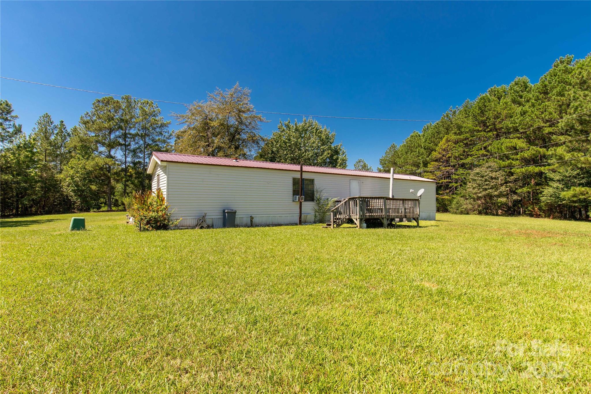 4331 Palmer Lloyd Road, Unit 11 Lancaster, SC 29720 - Photo 21 of 36 a view of a house with a yard and garage