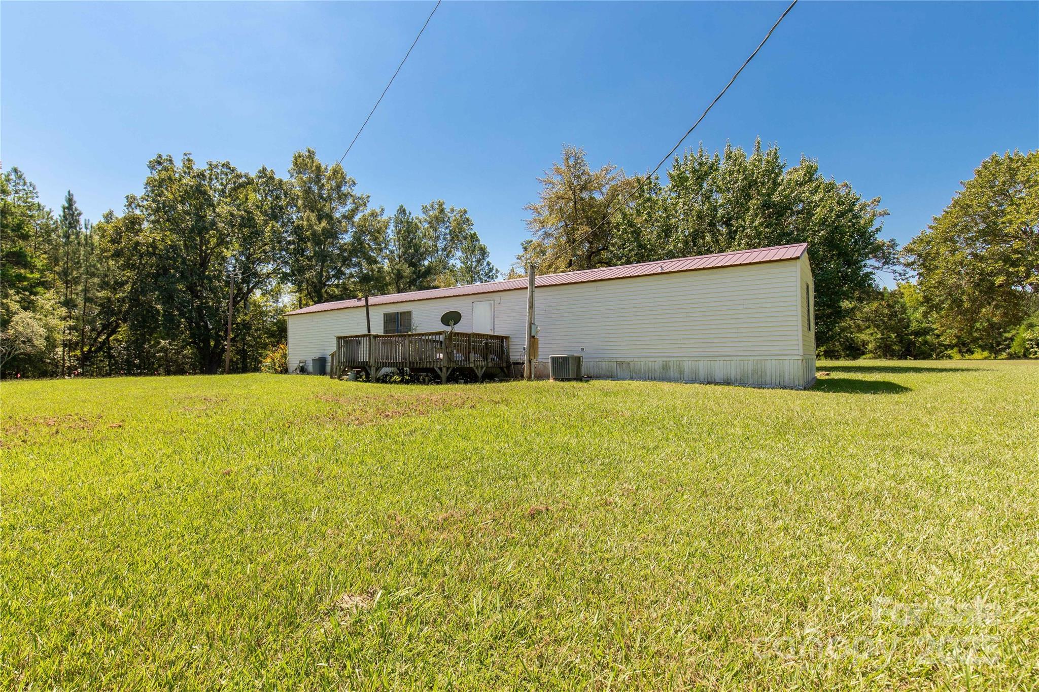 4331 Palmer Lloyd Road, Unit 11 Lancaster, SC 29720 - Photo 22 of 36 a front view of a house with a yard