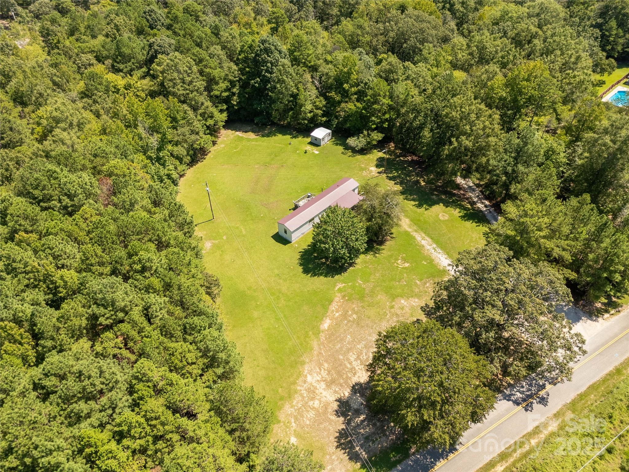 4331 Palmer Lloyd Road, Unit 11 Lancaster, SC 29720 - Photo 27 of 36 a view of a tree with a yard