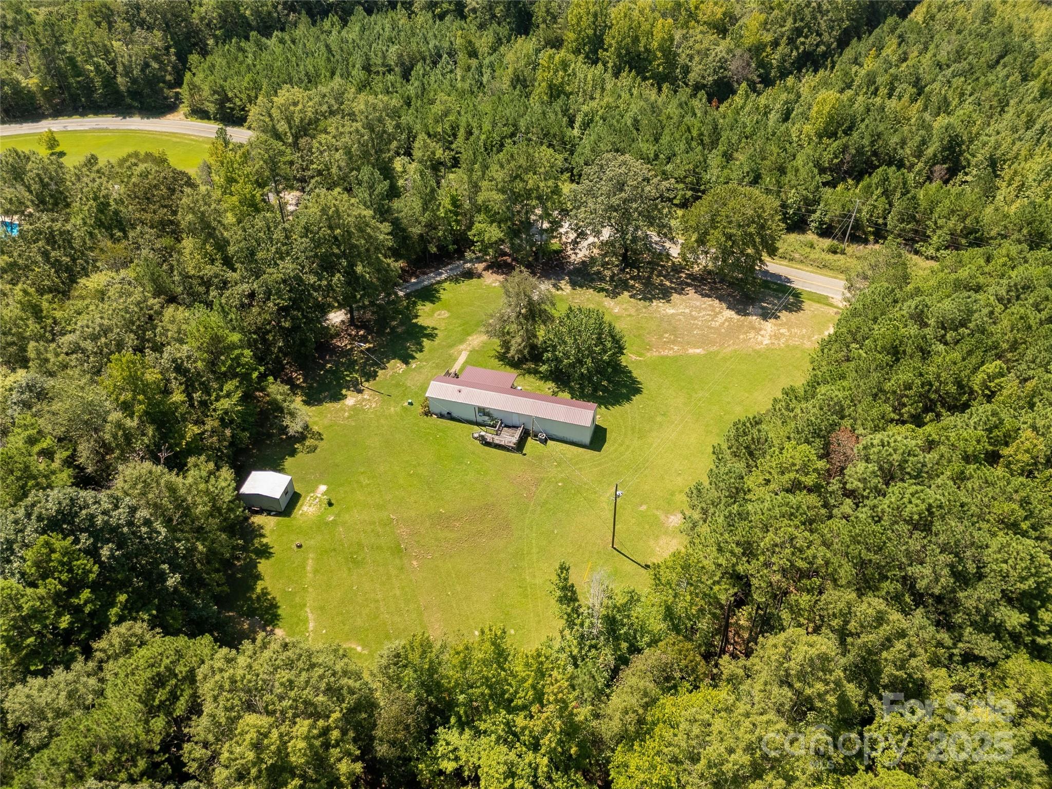 4331 Palmer Lloyd Road, Unit 11 Lancaster, SC 29720 - Photo 29 of 36 a view of a lake with a house