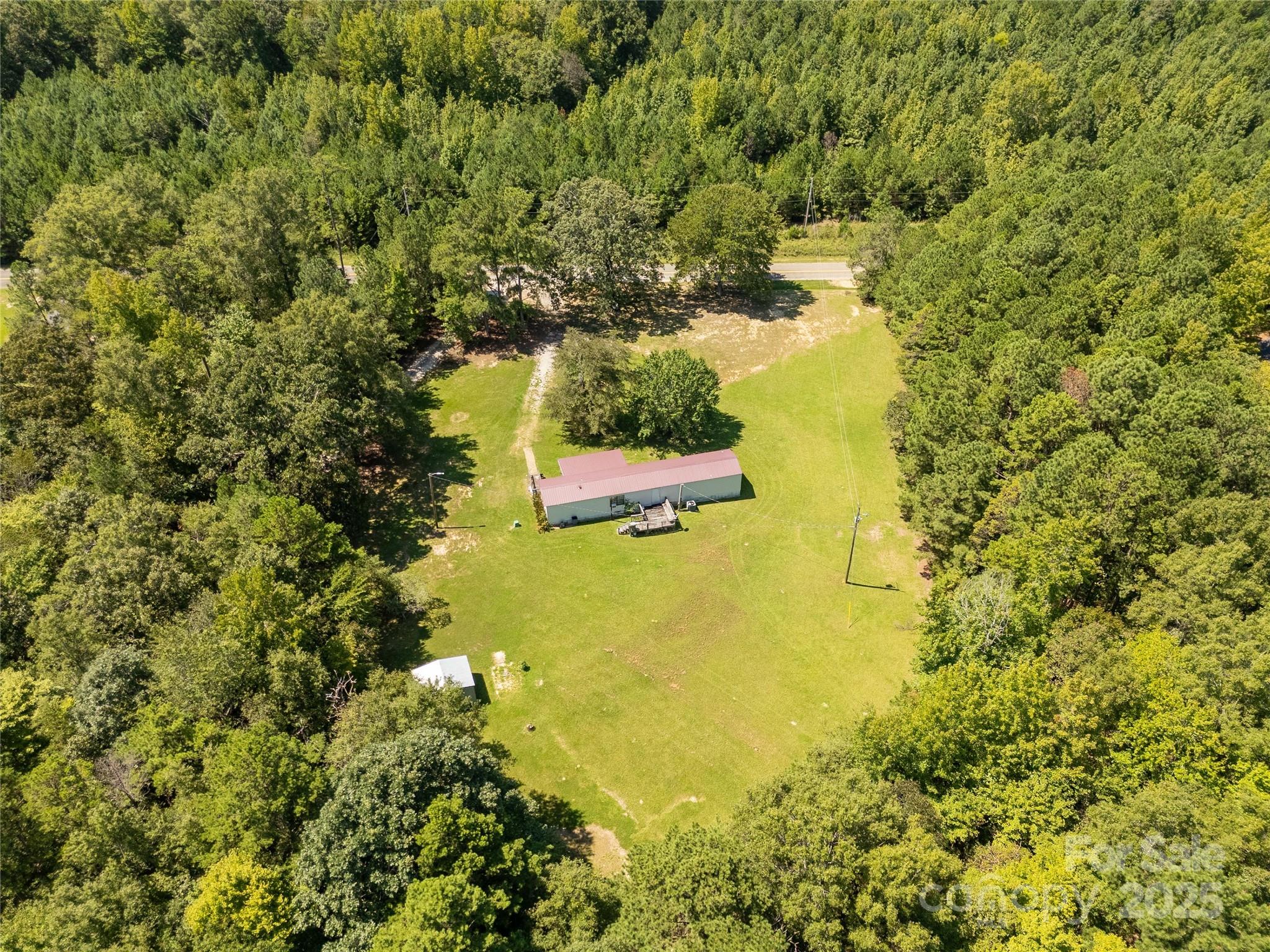 4331 Palmer Lloyd Road, Unit 11 Lancaster, SC 29720 - Photo 30 of 36 an aerial view of residential houses with outdoor space