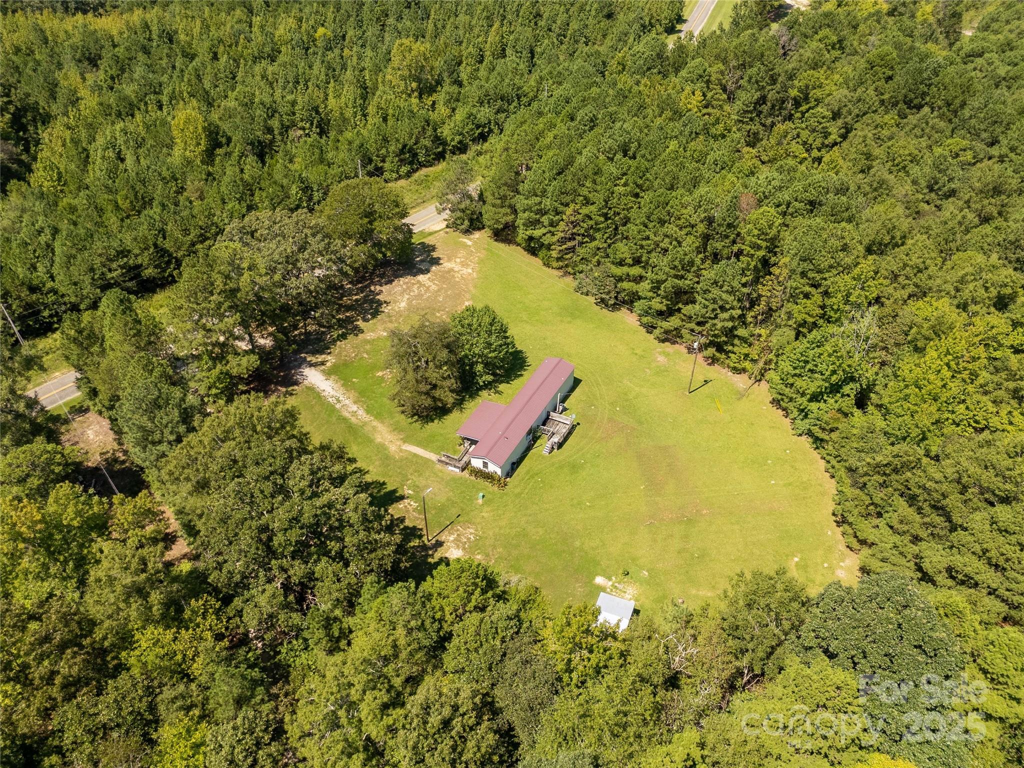 4331 Palmer Lloyd Road, Unit 11 Lancaster, SC 29720 - Photo 31 of 36 a view of a lake with a yard