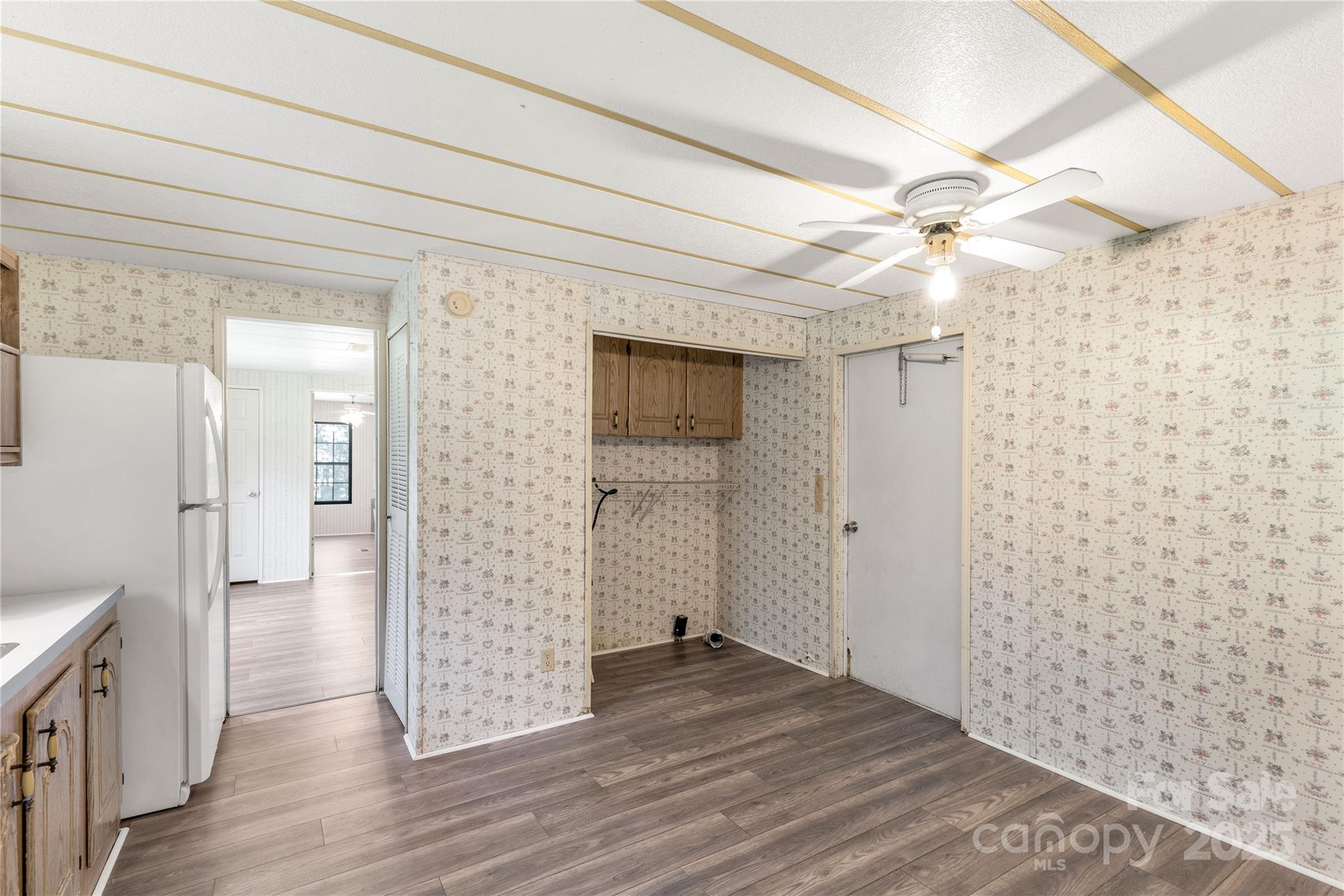 4331 Palmer Lloyd Road, Unit 11 Lancaster, SC 29720 - Photo 8 of 36 a view of a hallway with wooden floor and closet area