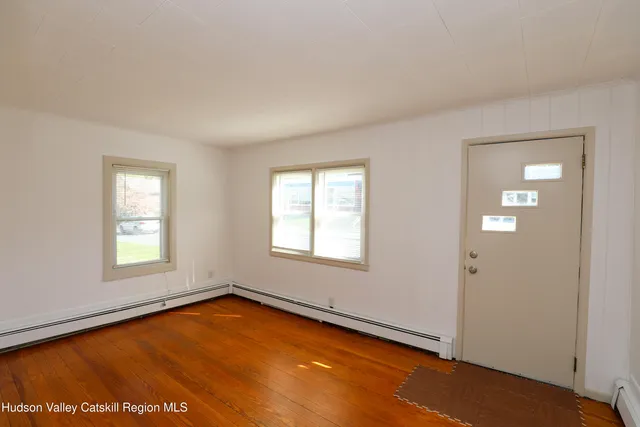 a view of a room with windows