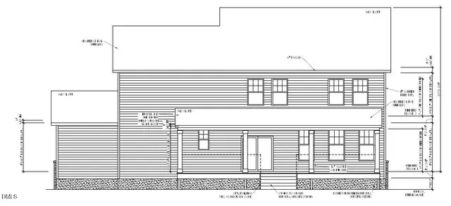 a view of a white building and windows