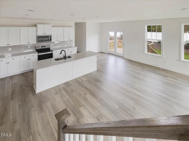 a bathroom with a sink a toilet and a bathtub