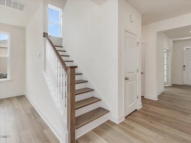 a bathroom with a bathtub a toilet and a shower