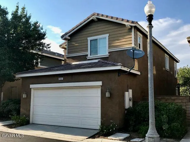 a front view of house with yard