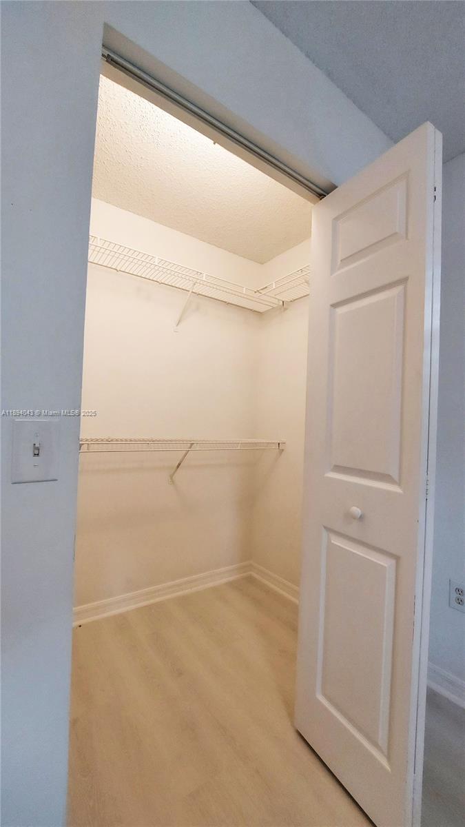 2457 Centergate Drive, Unit 108 Miramar, FL 33025 - Photo 15 of 18 a bathroom with a shower