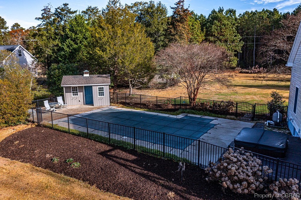 362 Beach Creek Road Lancaster, VA 22503 - Photo 41 of 47 View of swimming pool with an outdoor structure