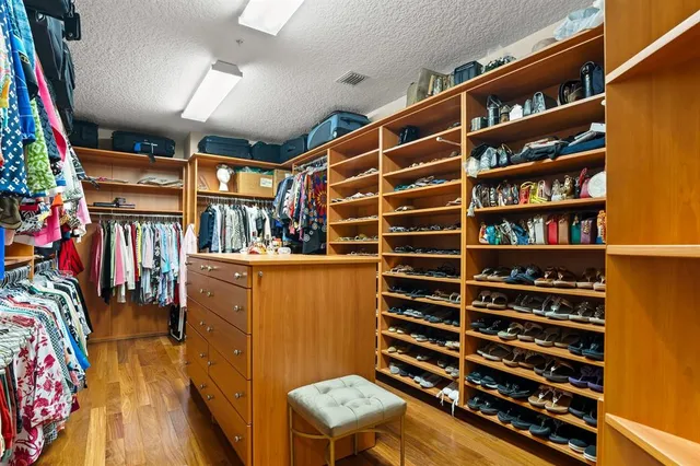 a view of an entryway with wooden floor