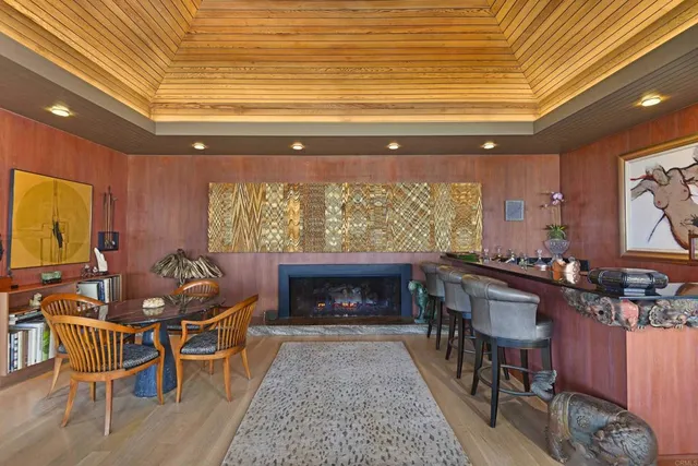 a outdoor living space with furniture and a floor to ceiling window