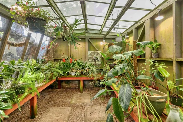 a view of a balcony with wooden floor and city view