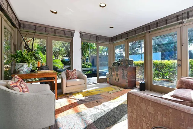 a bedroom with a bed and dresser