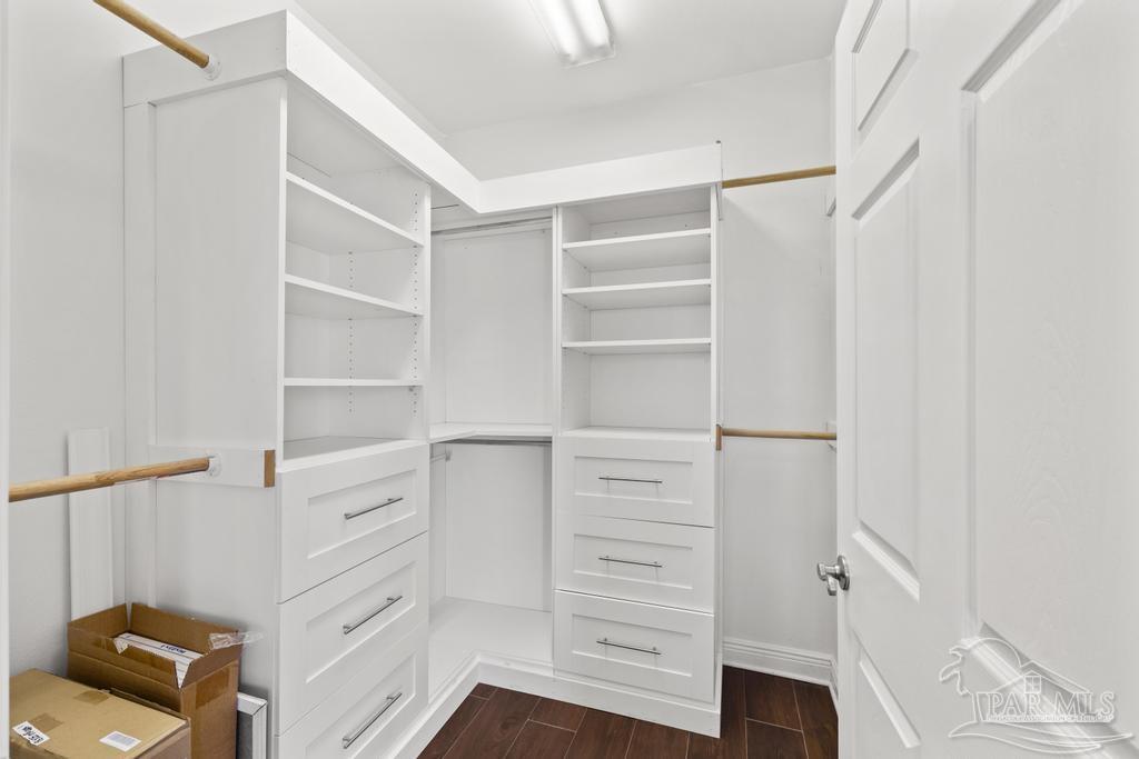 321 Gulfview Lane Perdido Key, FL 32507 - Photo 35 of 57 a view of walk in closet with empty racks