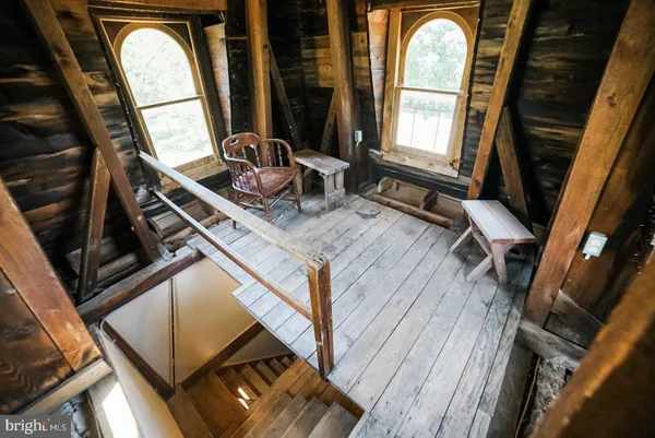 a view of washer and dryer with wooden floor