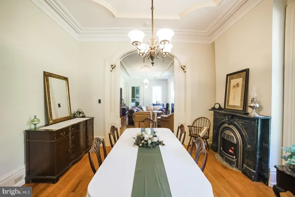 a view of a bedroom with furniture and a chandelier