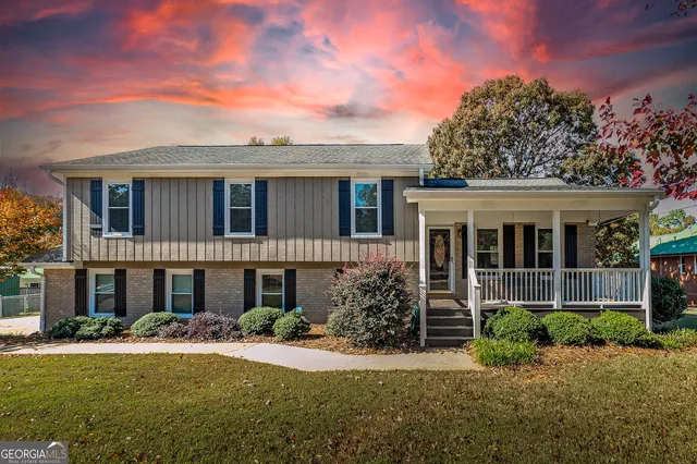 front view of a house with a yard
