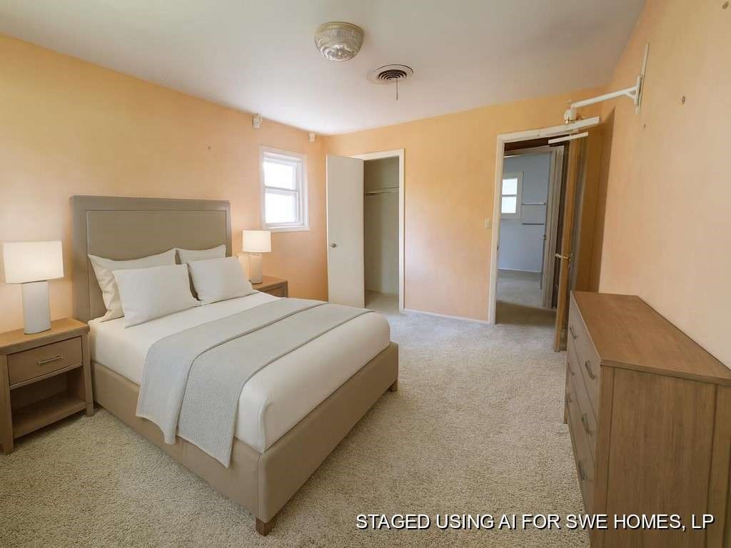 104 East 19th Street Littlefield, TX 79339 - Photo 13 of 19 a bedroom with a bed and window