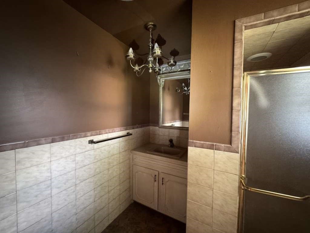 104 East 19th Street Littlefield, TX 79339 - Photo 16 of 19 a kitchen with a refrigerator and countertop