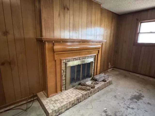 a view of a livingroom with a fireplace