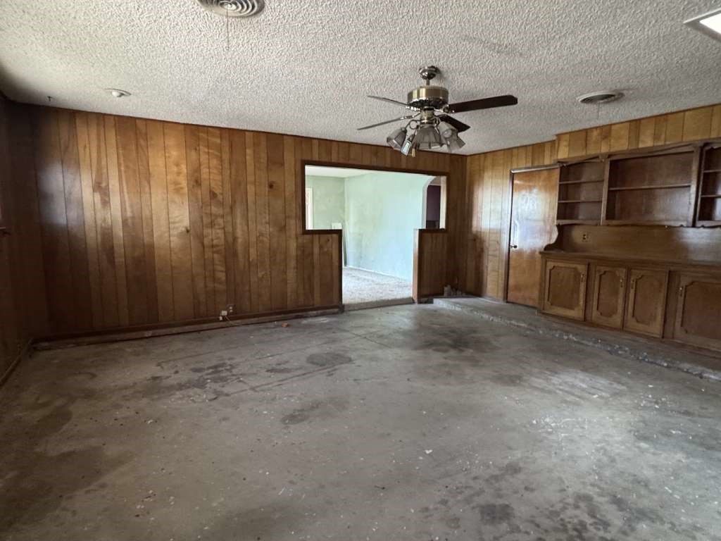104 East 19th Street Littlefield, TX 79339 - Photo 6 of 19 a view of an empty room with a window