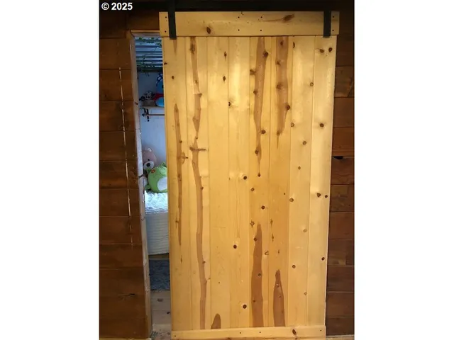 a view of a bathroom with shower and a bathroom