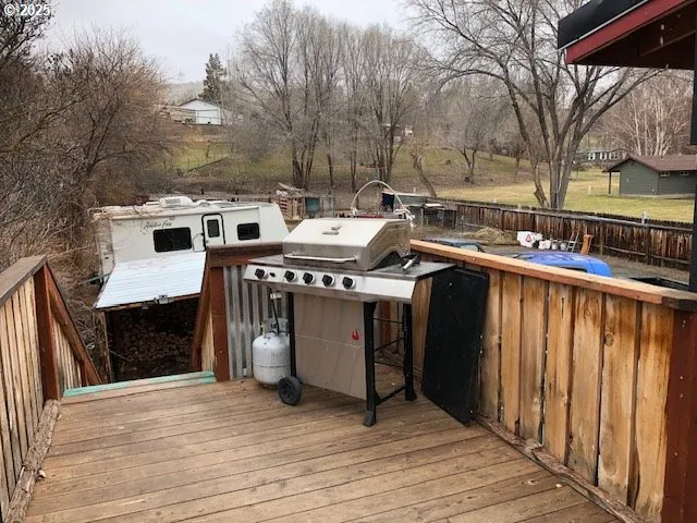 a view of staircase with white walls and a window