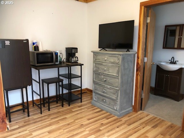 150 East Franklin Avenue Dayville, OR 97825 - Photo 28 of 33 a living room with furniture and a flat screen tv