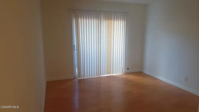 a view of a room with a window