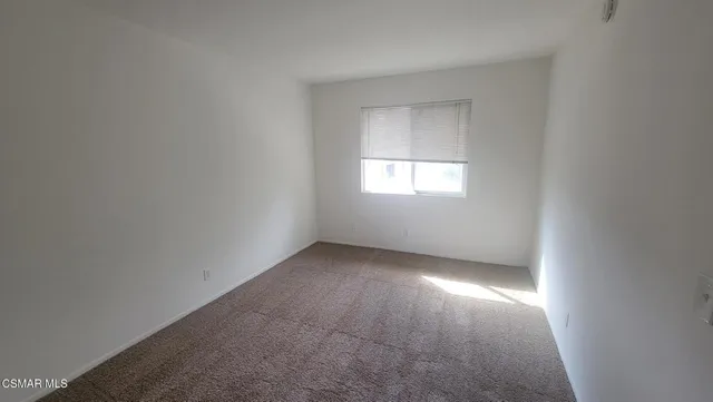 a view of a hallway with an empty space