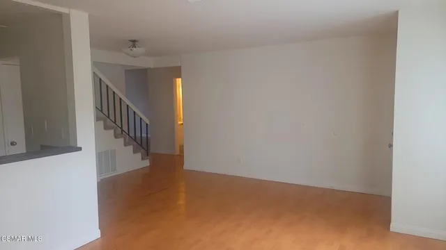 a view of a hallway with staircase