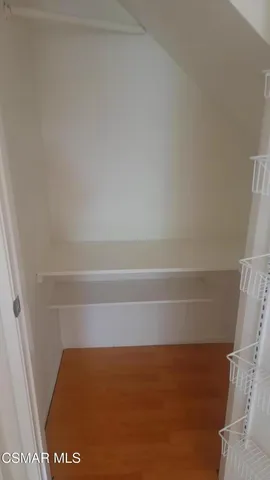 a view of small space with racks on the wall