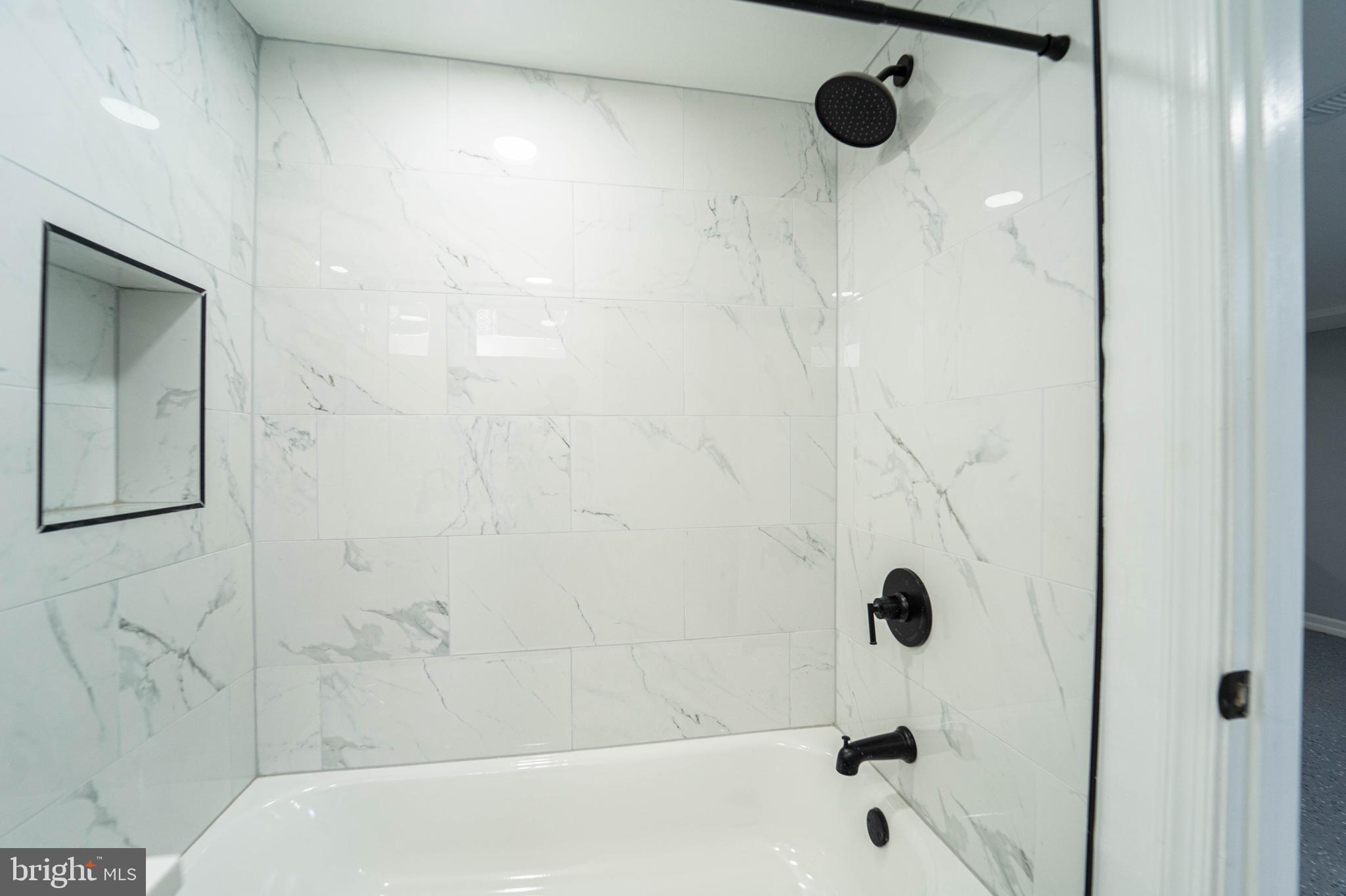 2841 Federal Street Baltimore, MD 21213 - Photo 24 of 39 a bathroom with a bathtub