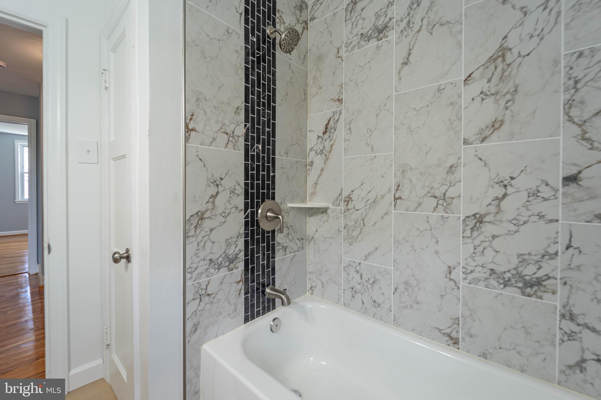 2841 Federal Street Baltimore, MD 21213 - Photo 30 of 39 a bathroom with a bathtub