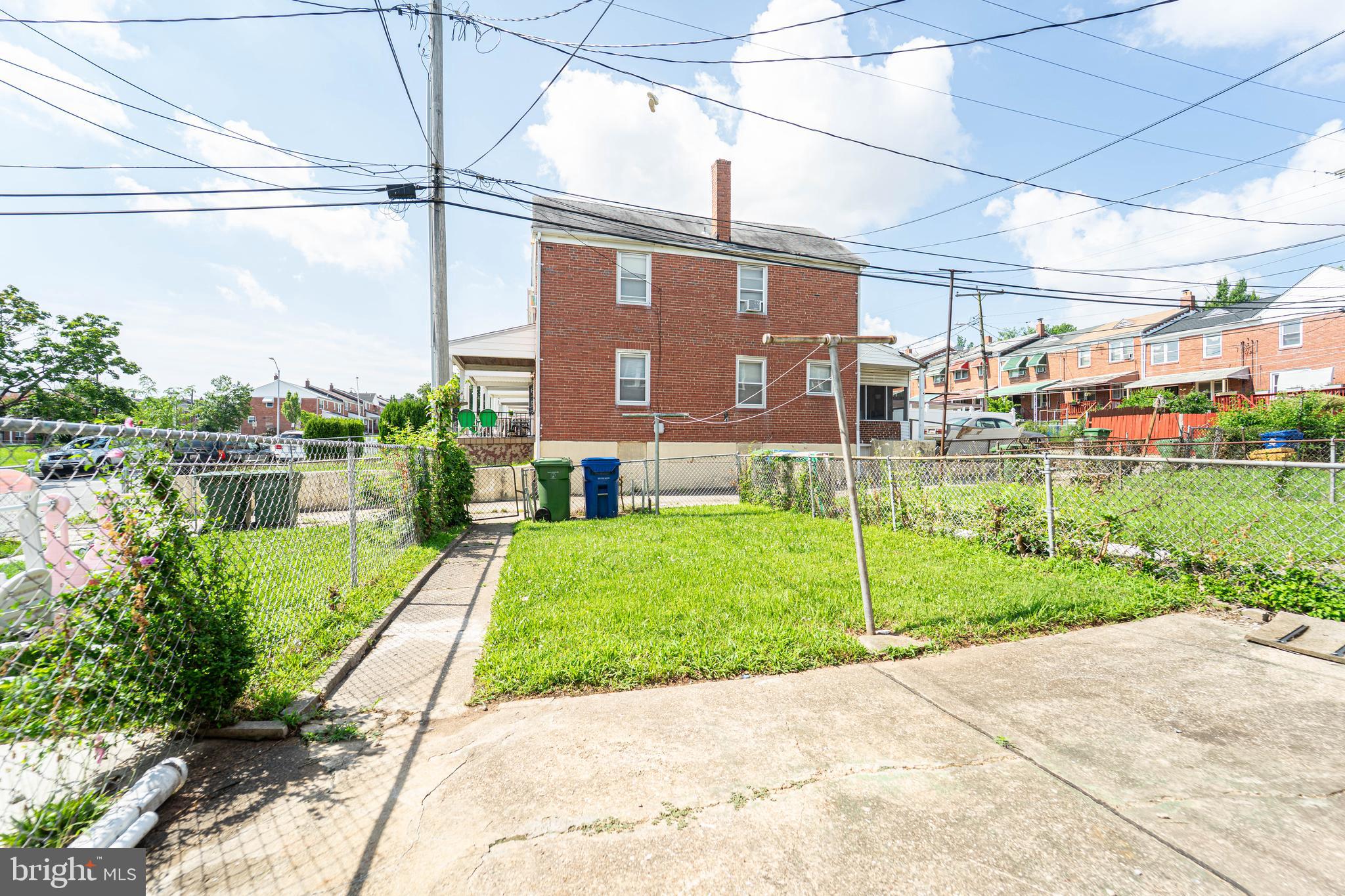 2841 Federal Street Baltimore, MD 21213 - Photo 38 of 39 a view of a back yard of the house and a yard