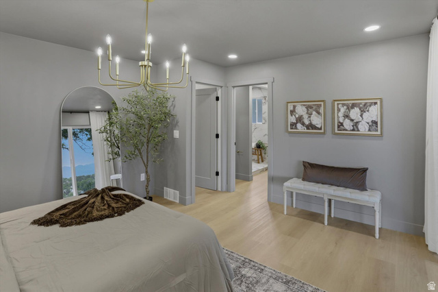 8760 Rustler Road Cottonwood Heights, UT 84093 - Photo 24 of 57 Bedroom featuring light wood-finish flooring, recessed lighting, and a gold-tone chandelier