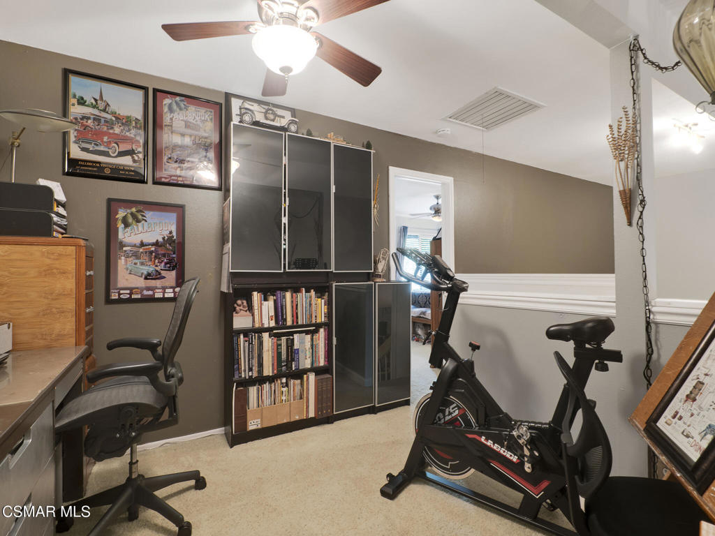 24829 Apple Street, Unit E Newhall, CA 91321 - Photo 17 of 29 a view of a room with gym equipment